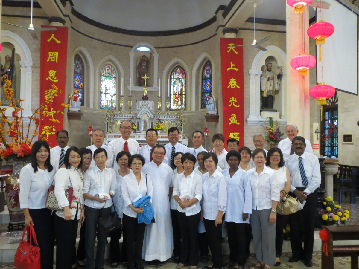 Group pic of Fr Liew with some of the Communion Ministers