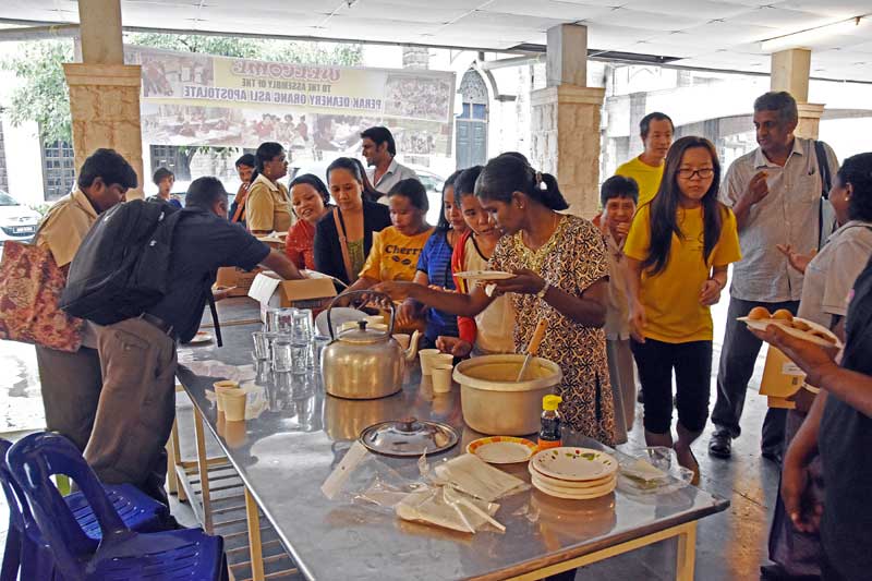 Participants trying out the fortified rice