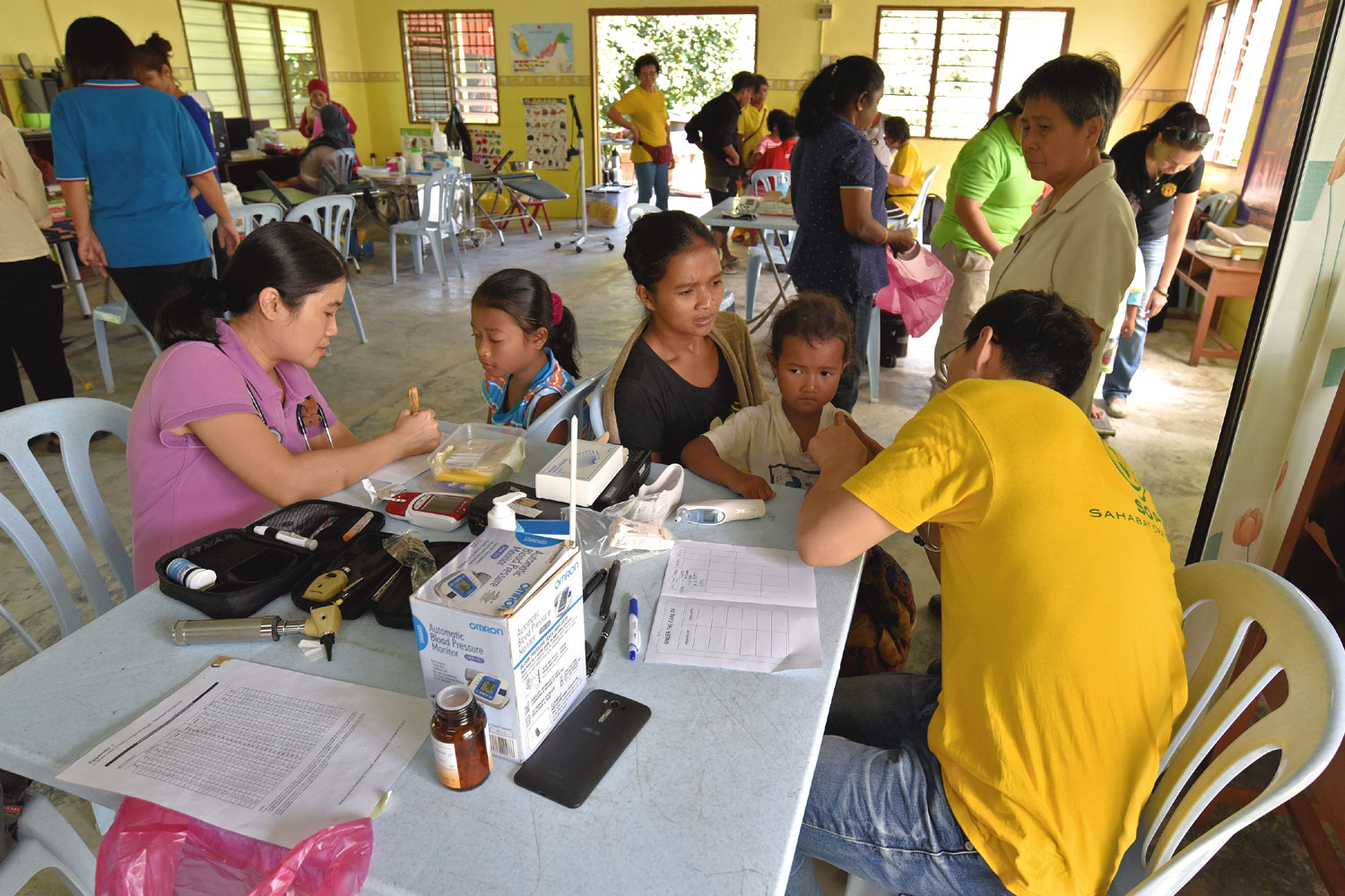 Doctors examining patients