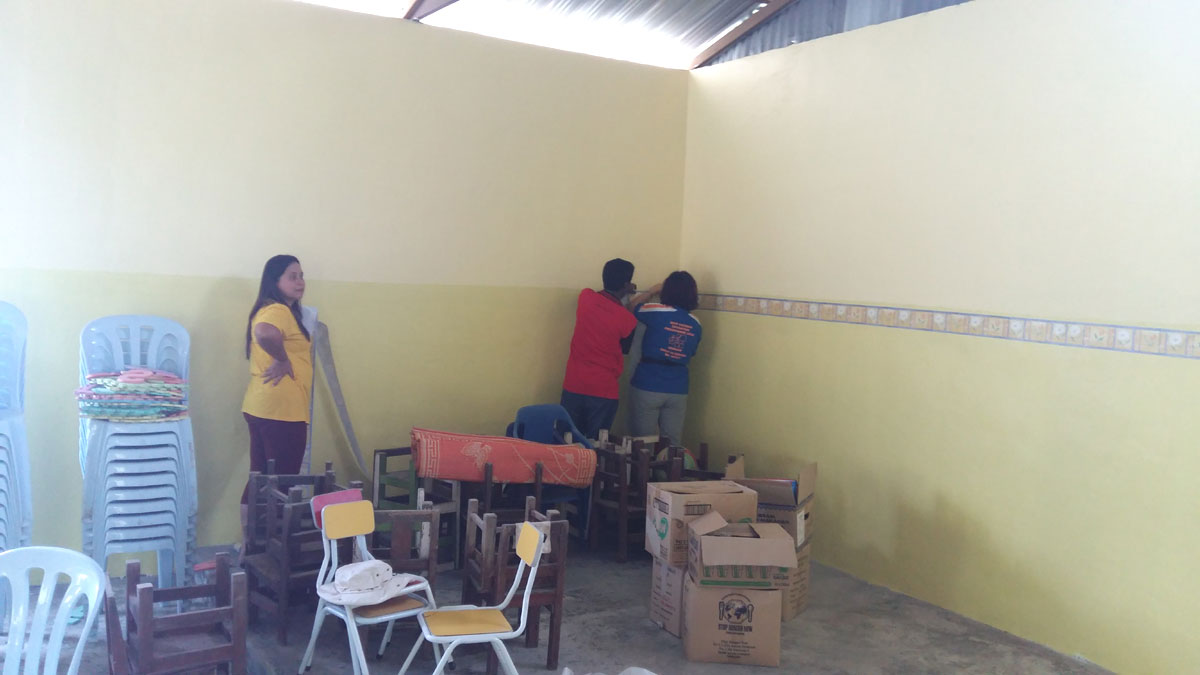 Setting up wallpaper inside learning centre