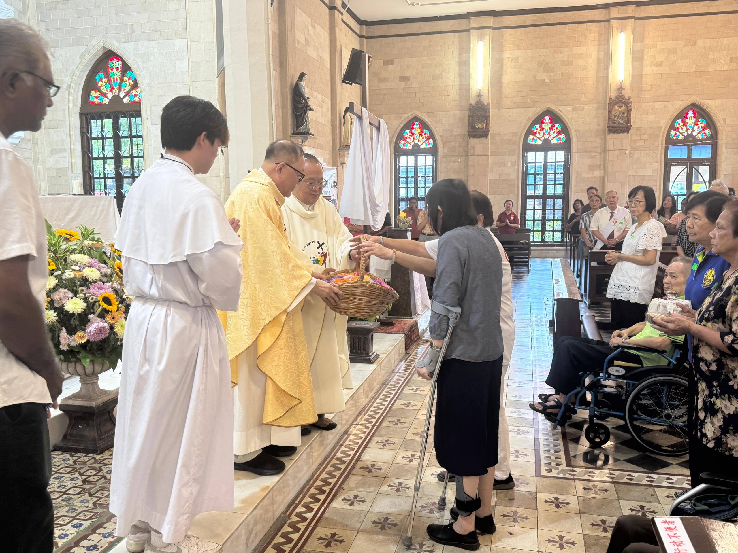 Anointing of the Sick and presenting gifts to the elderly and infirmed