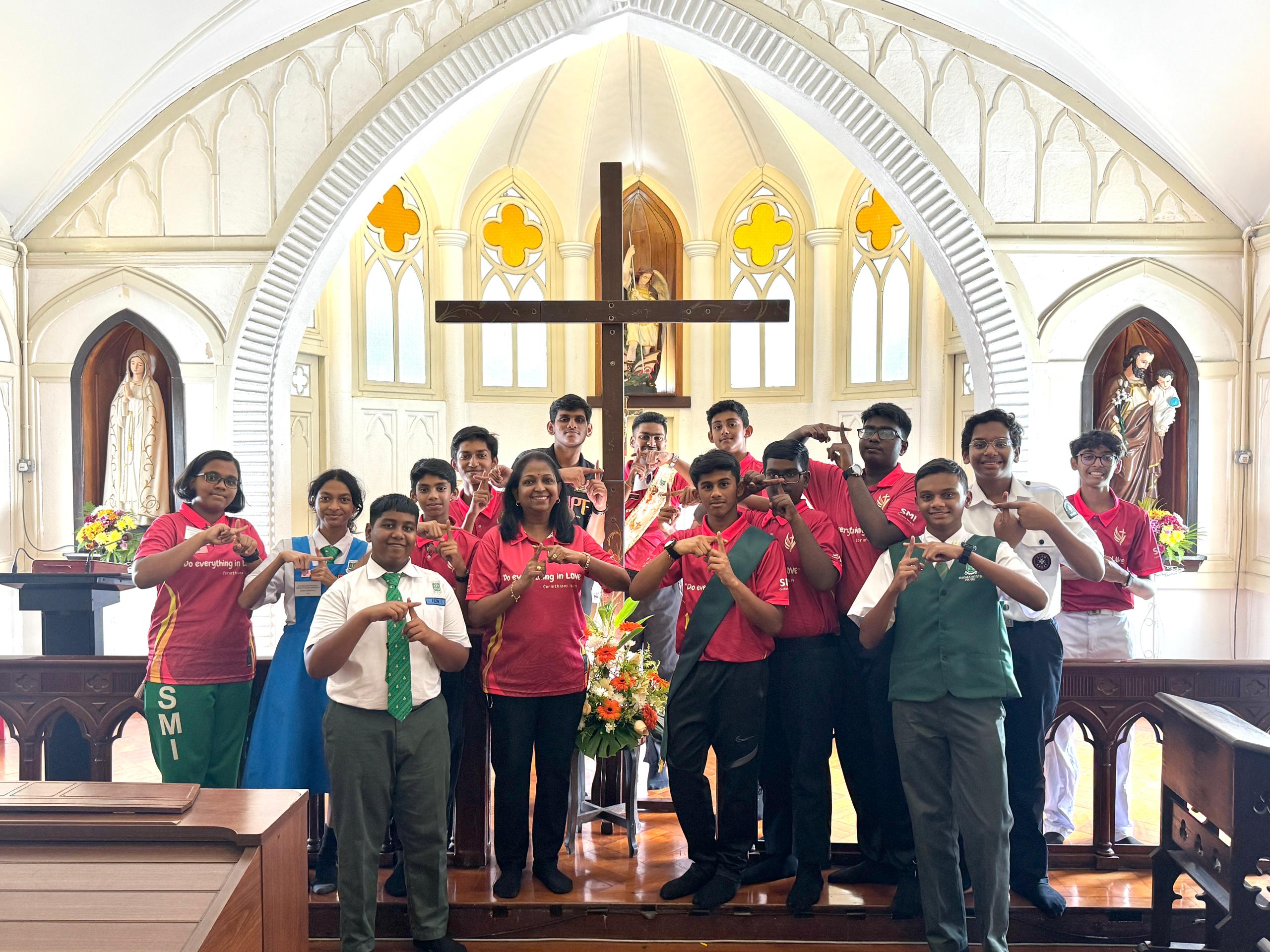Veneration of The Salib and mass at St Michael's Institution