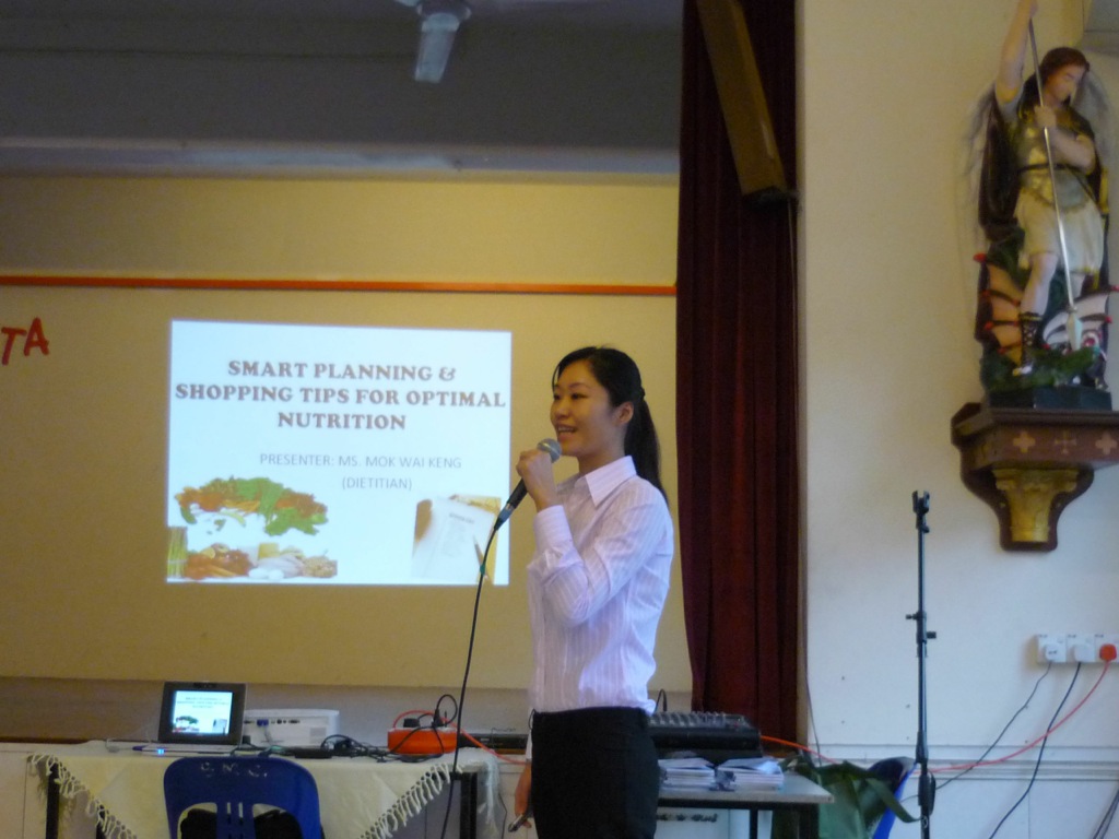 Gift presentation from Josephine Lim to Fr Liew