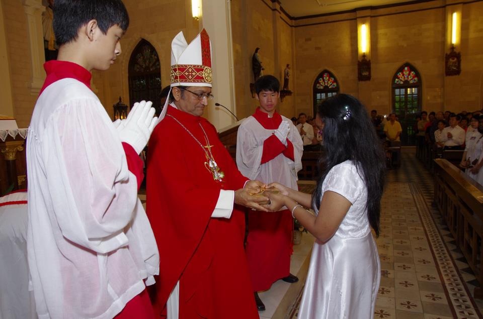 Bishop receiving collection